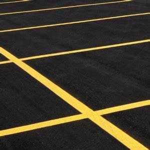 ParkLine Commercial crew applying crisp parking lot line striping